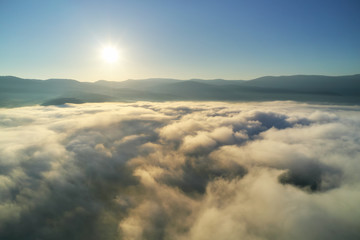 Aerial view white clouds in blue sky at morning.