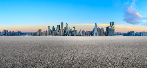 Asphalt highway passes through the city financial district in Chongqing at sunrise,China.