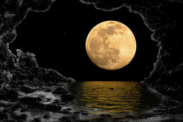 Planet Moon and shadows in the water look through the caves. Elements of the furnished by NASA.