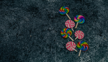 Candies on stone background