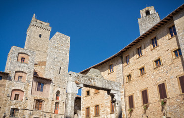 Square in the medieval town of San Gimignano - Tuscany Italy