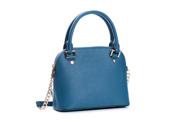 Fashionable blue female hand bag on white background