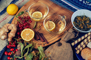 Two cups of medicinal herbal tea with ginger, lemon, cinnamon and lime.  Tonic and therapeutic hot...