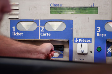 Man paying toll on french road with card