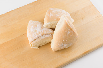fresh pastry on a wooden tray