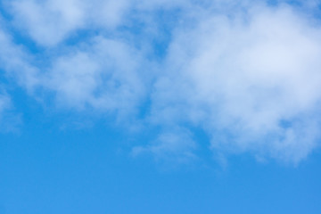 blue sky with light white clouds