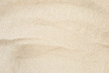 Full frame with fine sand on the beach and background texture.