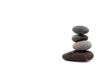 Tower of sea stones on a white isolated background