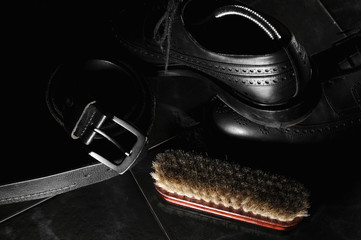 Black men's shoes.Oxfords leather strap and brush