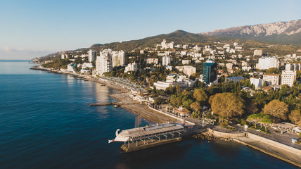 Naklejka na ściany i meble embankment in yalta panorama sunrise