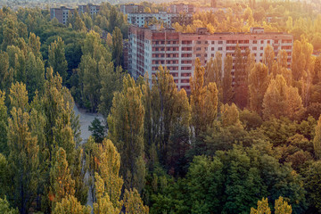 aerial view of the lost city of Pripyat. a lot of empty concrete floors overgrown with trees....