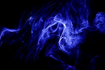 Fototapeta premium Blue smoke on black background