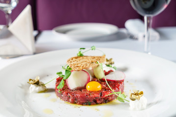 beef tartar with egg and radish