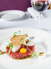 beef tartar with egg and radish