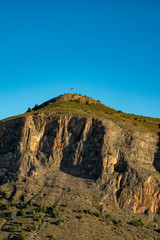Fototapeta na wymiar Sierra de Orihuela and Cruz de la Muela cross, Orihuela, Alicante province, Spain