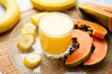Tropical juice with banana and papaya