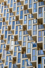 Facade of a modern apartment building, exterior and architecture design concept