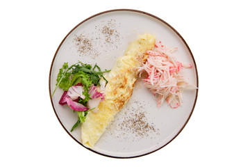 Omelette with crab meat and salad