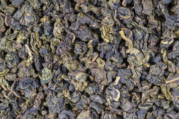 Green tea leaves background. Abstract food textures. Close up