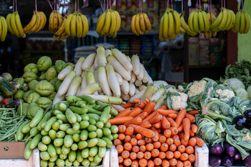 Fresh vegetables on display at outdoor farmers market at little India, street market, Singapore , closeup