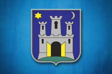 Coat of arms of Zagreb, Croatia, on dirty blue concrete background.