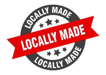 locally made sign. locally made black-red round ribbon sticker
