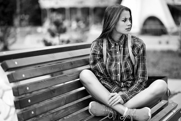 Girl in a clown makeup black and white