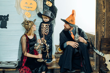 Sad halloween. Childhood fears. A terrible tale at night. Witch and wizard. Sad child is afraid of...