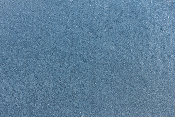 Frost auf einer Oberfläche aus Metall