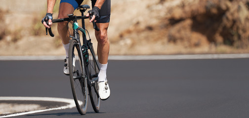 Fototapeta na wymiar Road bike cyclist man cycling,athlete on a race cycle