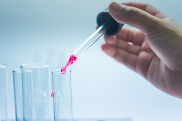 Science chemical tubes with colorful liquid. Medical laboratory research background. pharmacology and biotechnology concept. Copy space for texting.