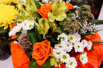 A bouquet of different flowers close-up. Floral holiday background