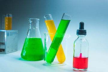 Science chemical tubes with colorful liquid. Medical laboratory research background. pharmacology and biotechnology concept. Copy space for texting.