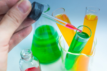 Science chemical tubes with colorful liquid. Medical laboratory research background. pharmacology and biotechnology concept. Copy space for texting.