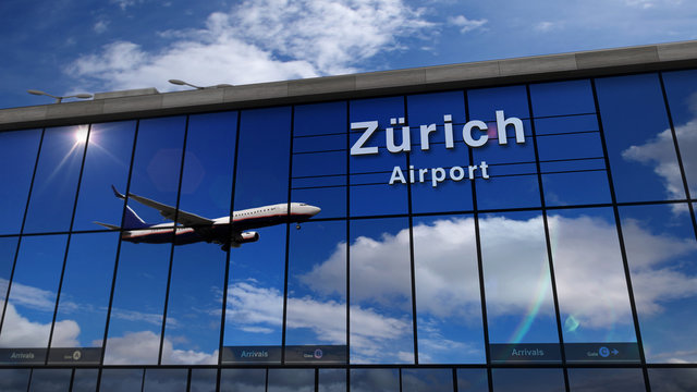 Airplane landing at Zurich Switzerland mirrored in terminal