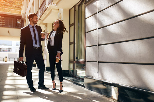 Positive Young Office Workers Having Fun In The Street, Friendshipo, Happiness, Full Length Photo. Copy Space