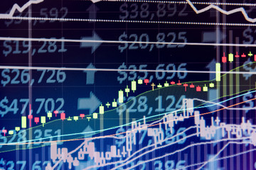 Charts of financial instruments with various type of indicators including volume analysis for professional technical analysis on the monitor of a computer. Fundamental and technical analysis concept.