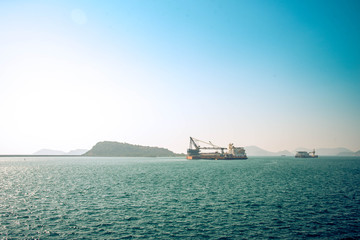 International Logistics and transportation of Container Giant ship in the ocean. Shipping and transportation as concept.