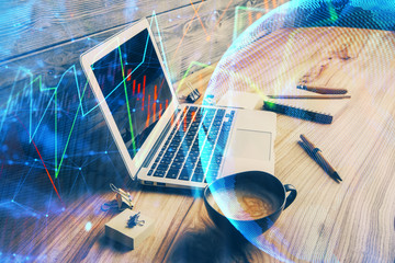Multi exposure of chart and financial info and work space with computer background. Concept of...
