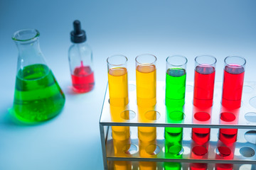 Science chemical tubes with colorful liquid. Medical laboratory research background. pharmacology and biotechnology concept. Copy space for texting.