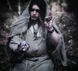 Fairy magician. A sorcerer with a glass sphere, a magical spell and a ritual. Elder with a staff...