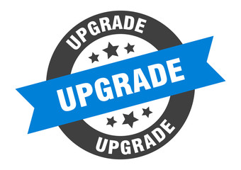 upgrade sign. upgrade blue-black round ribbon sticker