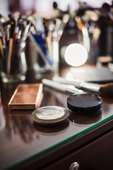 Make-up table, make-up brushes, cosmetics