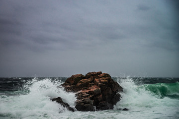 waves crashing on the rocks