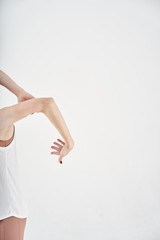 young woman in white dress yoga
