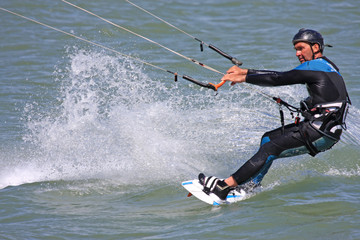 Fototapeta premium kitesurfer riding his board