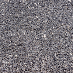 Seamless dark grey granite stone texture. Material construction.