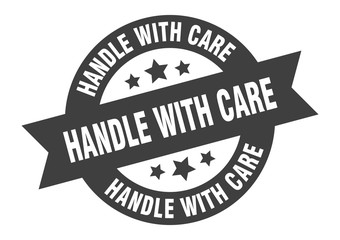 handle with care sign. handle with care black round ribbon sticker