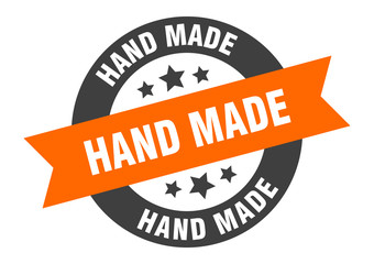 Fototapeta premium hand made sign. hand made orange-black round ribbon sticker