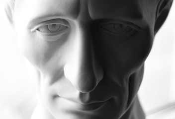 close-up face of gypsum Roman emperor Julius Caesar